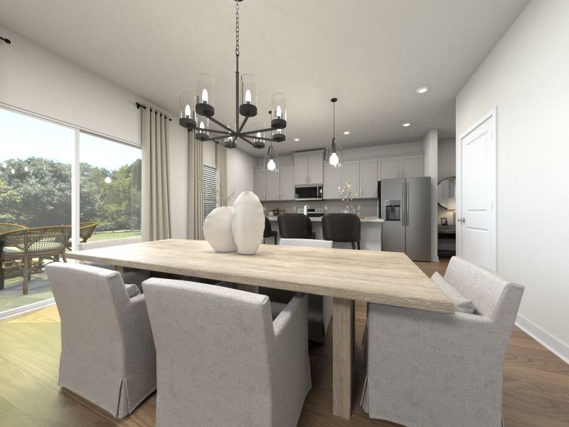 The open floorplan creates a seamless flow between the kitchen and dining areas.