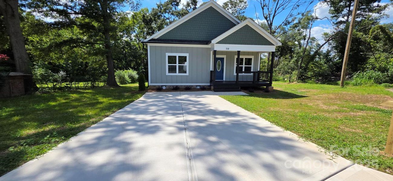 Front exterior of a new home in , Gastonia, NC, highlighting curb appeal (Image 24).