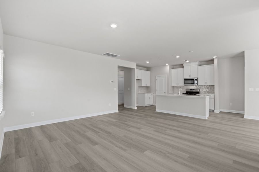 Spacious, unfurnished interior of a new home in Waterside - Coastline Series, Longs (Image 15).