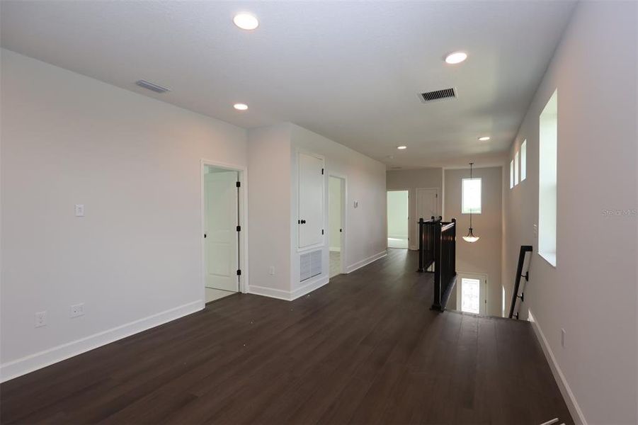 Spacious, unfurnished interior of a new home in Lake Star at Ovation, Winter Garden (Image 27).