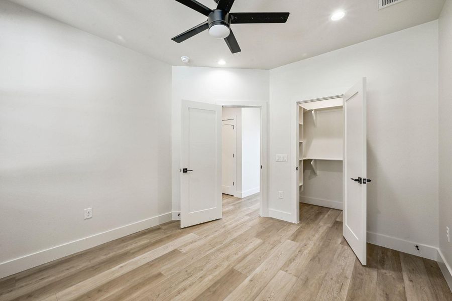 Spacious reach-in closet and neutral tones create a versatile layout that complements the home’s cohesive design. Spacious reach-in closet and neutral tones create a versatile layout that complements the home’s cohesive design.