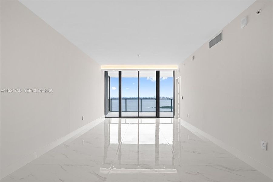 Spacious, unfurnished interior of a new home in Aria Reserve, Miami (Image 58).