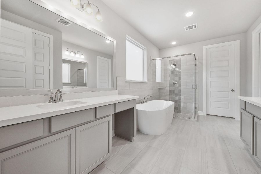 Furnished interior view inside a new home in Sunterra, Katy (Image 14).