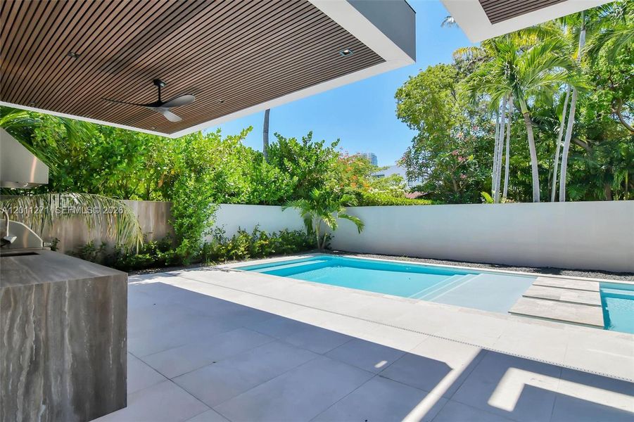 Exterior details and patio area of a home in , Miami (Image 4).