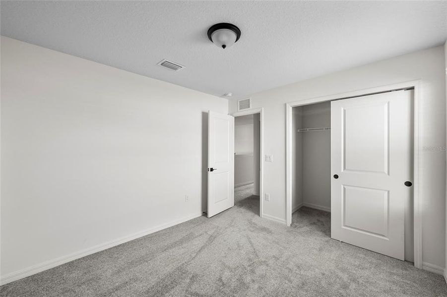 Spacious, unfurnished interior of a new home in Heron Bay, Palmetto (Image 26). Spacious, unfurnished interior of a new home in Heron Bay, Palmetto (Image 26).