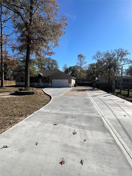 Front exterior of a new home in , Cleveland, TX, highlighting curb appeal (Image 27). Front exterior of a new home in , Cleveland, TX, highlighting curb appeal (Image 27).