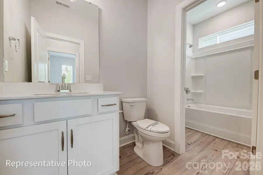 Furnished interior view inside a new home in Heritage - 55+ Community, Indian Trail (Image 8).