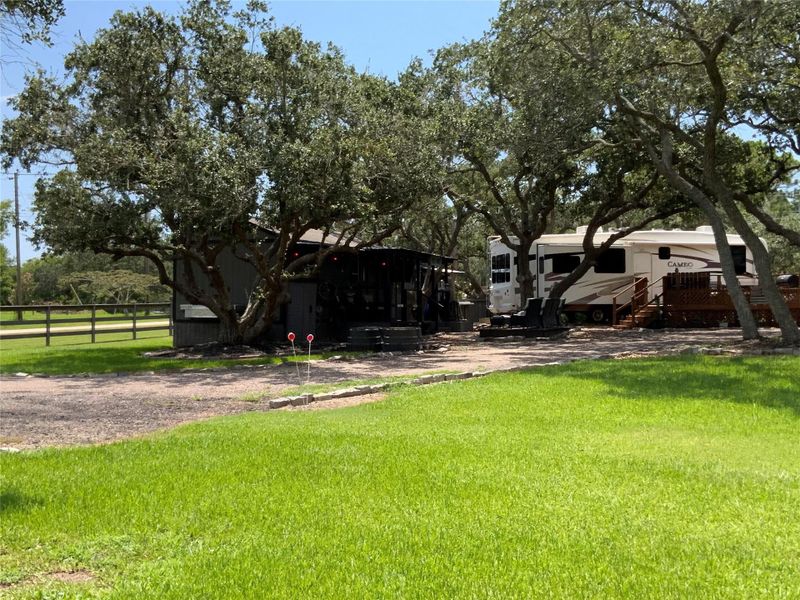 Front exterior of a new home in , Palacios, TX, highlighting curb appeal (Image 14). Front exterior of a new home in , Palacios, TX, highlighting curb appeal (Image 14).