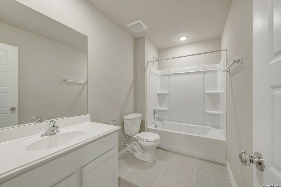 Furnished interior view inside a new home in Greenspoint Heights, Seguin (Image 9).
