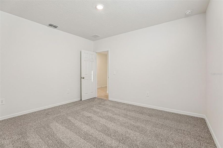 Spacious, unfurnished interior of a new home in Lawson Dunes - Signature Series, Haines City (Image 34). Spacious, unfurnished interior of a new home in Lawson Dunes - Signature Series, Haines City (Image 34).