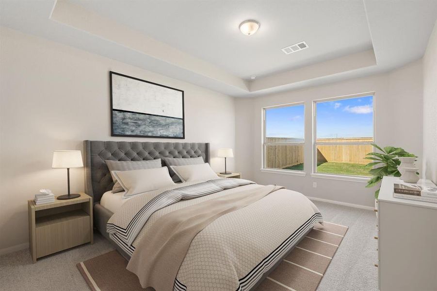 The primary bedroom is generously sized, creating a tranquil and spacious retreat that offers ample room for relaxation. Featuring plush carpet, high ceilings, fresh paint, and large windows that lets in natural lighting throughout the day.