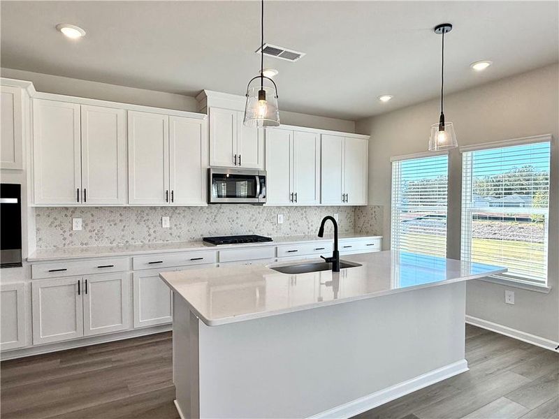 Furnished interior view inside a new home in Vines at Mill Creek - Estate Series, Braselton (Image 10). Furnished interior view inside a new home in Vines at Mill Creek - Estate Series, Braselton (Image 10).