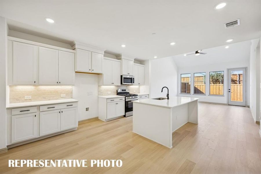 With ample storage and prep space, this dream kitchen is waiting for you to call it your own!  REPRESENTATIVE PHOTO