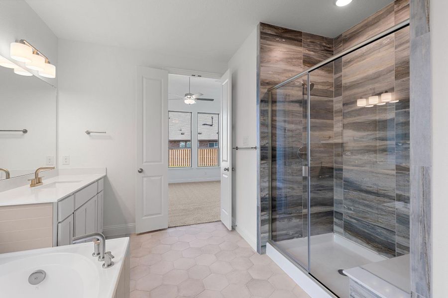 Primary Bath retreat with dual vanities, garden tub & walk-in shower