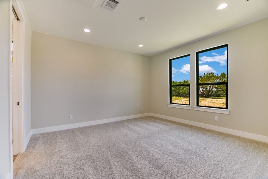 Representative unfurnished interior of a home built from the Casita by Giddens Homes in Burnet Hilltop Estates, Cedar Park (Image 74).