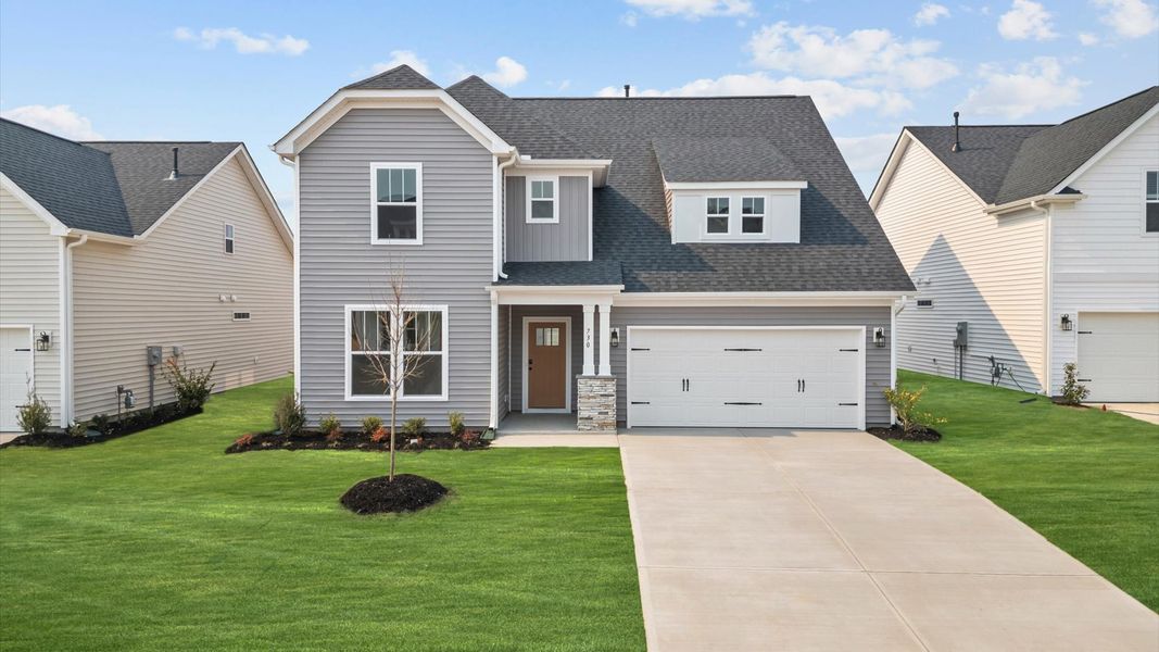 Representative exterior photo of a completed home built from the Drayton by DRB Homes in Walnut Ridge, Inman, SC (Image 18).
