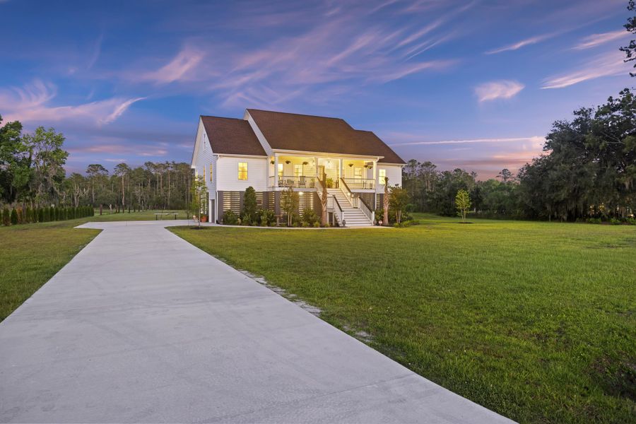 Front exterior of a new home in , Meggett, SC, highlighting curb appeal (Image 22).
