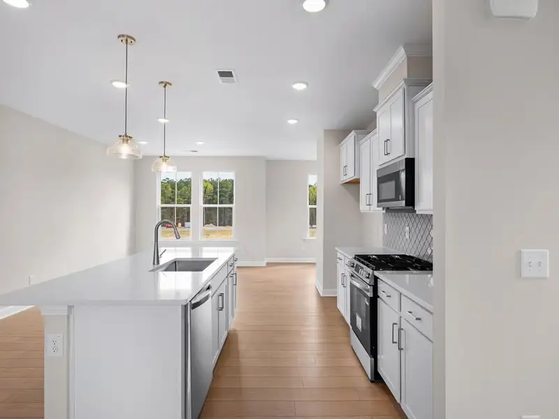 Furnished interior view inside a new home in Forestville Yard Townhomes, Knightdale (Image 6).