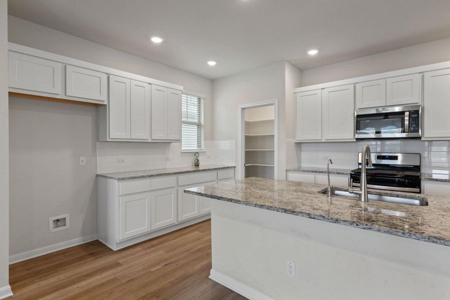 Furnished interior view inside a new home in The Ridge at Trinity Ranch, Elgin (Image 14). Furnished interior view inside a new home in The Ridge at Trinity Ranch, Elgin (Image 14).