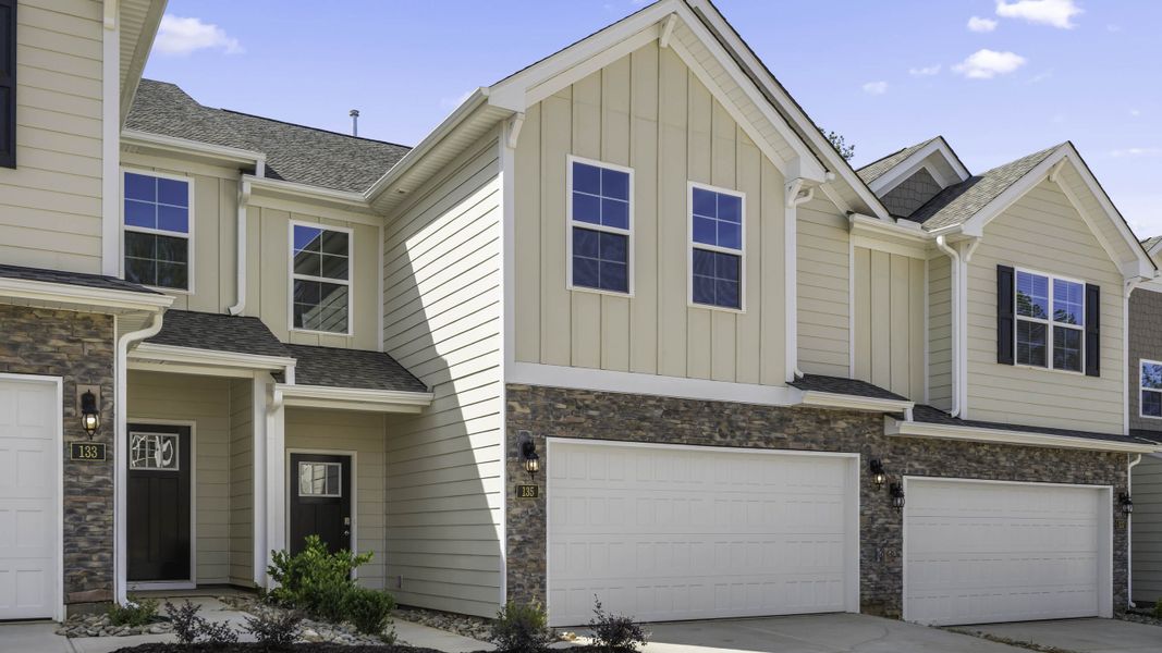 Front exterior of a new home in Lybrook Village, Advance, NC, highlighting curb appeal (Image 2). Front exterior of a new home in Lybrook Village, Advance, NC, highlighting curb appeal (Image 2).