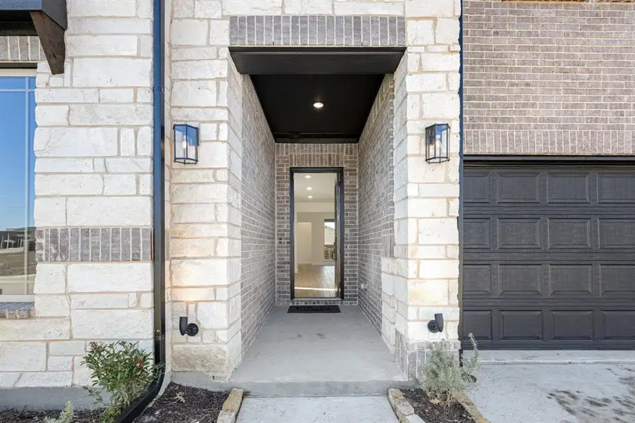 Exterior details and patio area of a home in Bear Creek Classic 50, Lavon (Image 4).