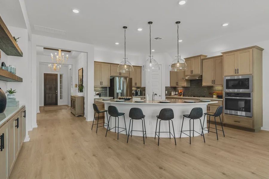 Representative furnished interior of a home built from the Mckenna by Chesmar Homes in Santa Rita Ranch, Liberty Hill (Image 5).