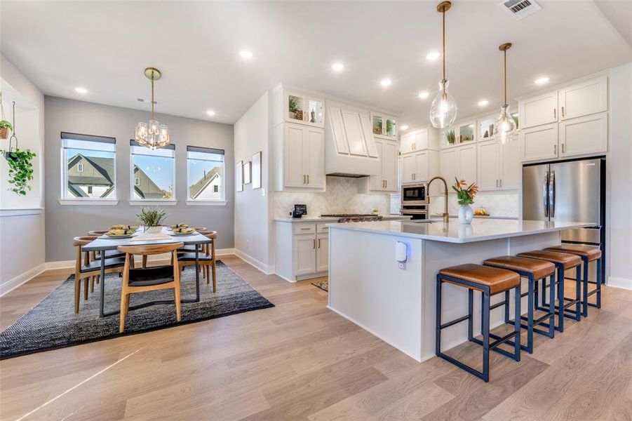Furnished interior view inside a new home in Pecan Square - Estates, Northlake (Image 30).