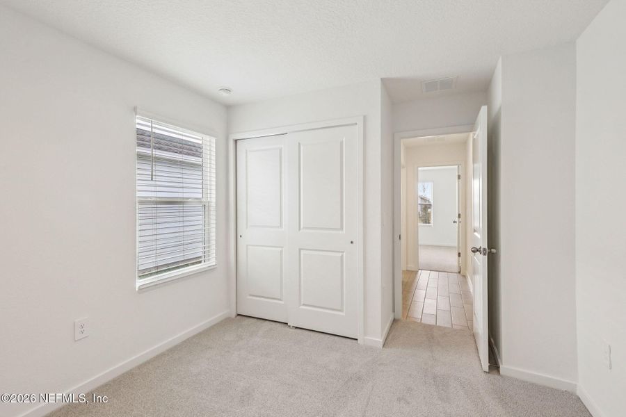 Spacious, unfurnished interior of a new home in Cypress Meadows - Signature Series, Jacksonville (Image 26).