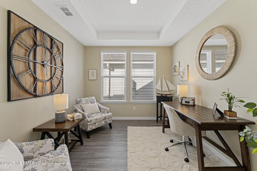 Furnished interior view inside a new home in Summer Bay at Grand Oaks, St. Augustine (Image 7).
