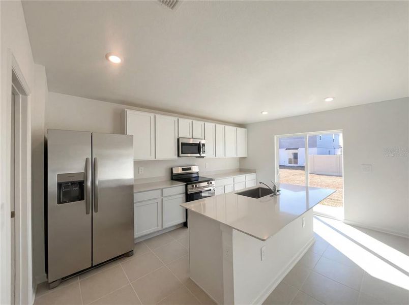 Furnished interior view inside a new home in Peace Creek Reserve, Winter Haven (Image 12).