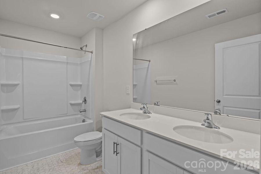 Furnished interior view inside a new home in Mills at Long Creek, Dallas (Image 10).