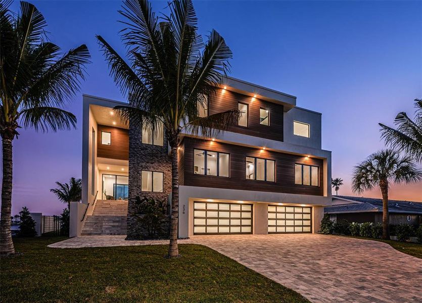 Front exterior of a new home in , Belleair Beach, FL, highlighting curb appeal (Image 30).