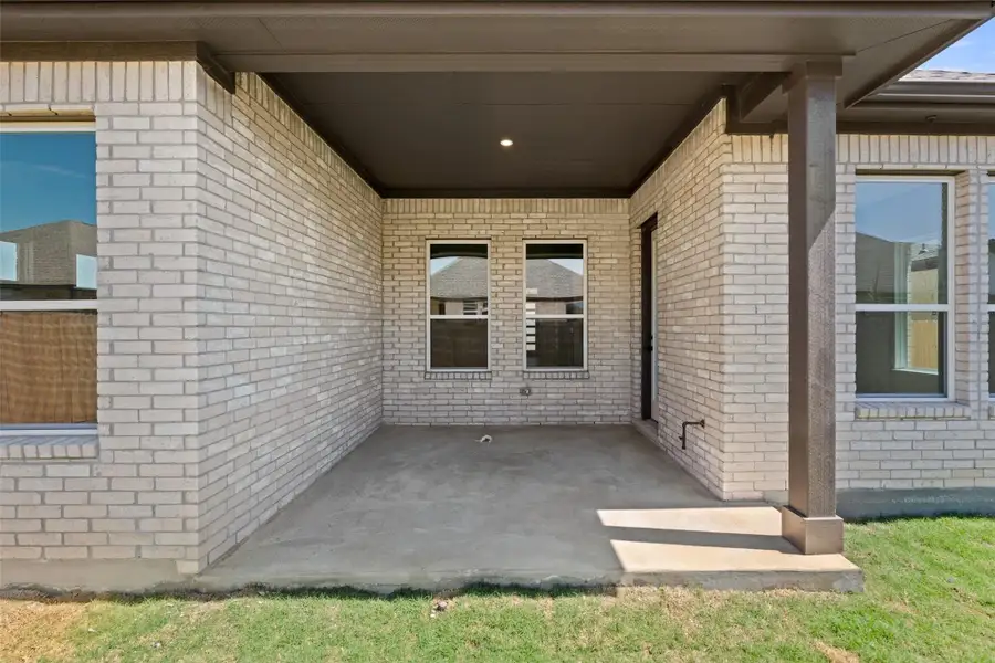 Exterior details and patio area of a home in Persimmon, Buda (Image 3).