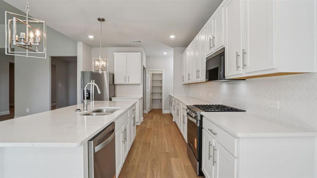 Photo is not of the actual home, but is an inspirational photo of builder’s model home and may depict options, furnishings, and/or decorator features that are not included.