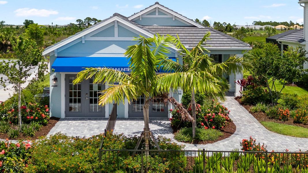 Front exterior of a new home in Palmera Real Estate and Homes for Sale in Venice, FL - Neal Communities, Venice, FL, highlighting curb appeal (Image 21). Front exterior of a new home in Palmera Real Estate and Homes for Sale in Venice, FL - Neal Communities, Venice, FL, highlighting curb appeal (Image 21).