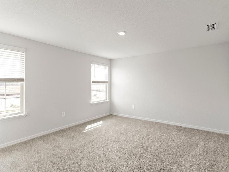 Your owner`s suite is accessed from a private entry hallway - Danyella bungalow by Highland Homes