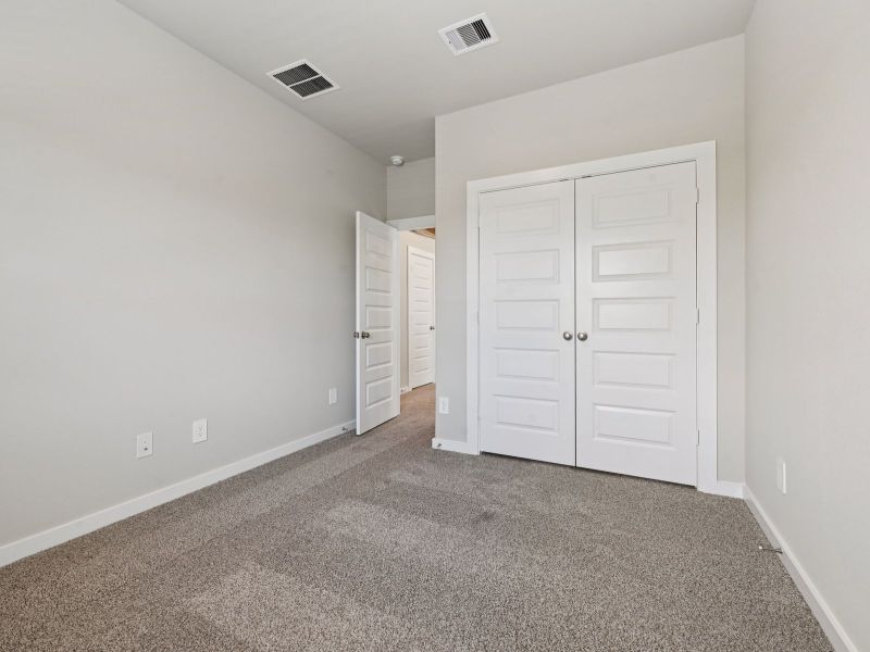 Spacious, unfurnished interior of a new home in Pinewood Trails - City Series, Atascocita (Image 28).