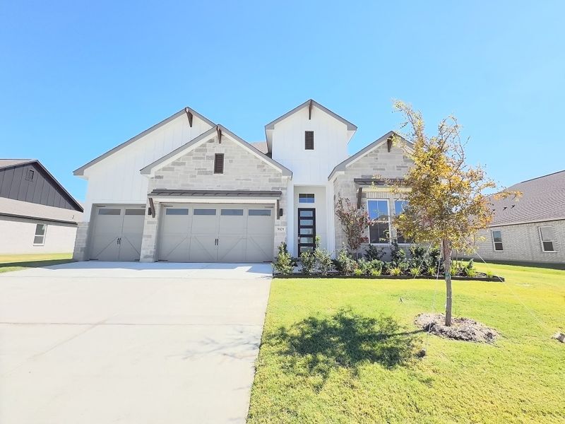 Front exterior of a new home in Polo Ridge, Mesquite, TX, highlighting curb appeal (Image 16).