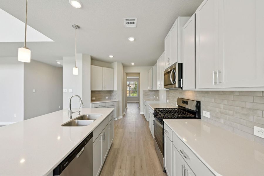 Photo is not of the actual home, but is an inspirational photo of builder’s model home and may depict options, furnishings, and/or decorator features that are not included