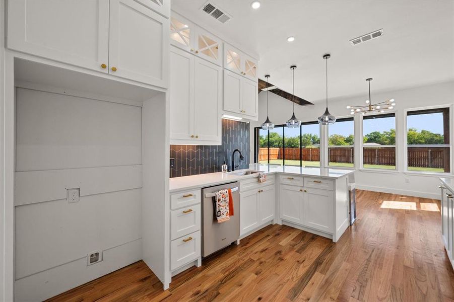 Custom cabinets with glass & LED lighting