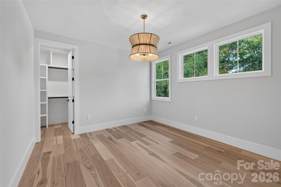 Bed 3: Eye Catching-oversized luxury lighting & show-stopper Hickory plank flooring in every bedroom!