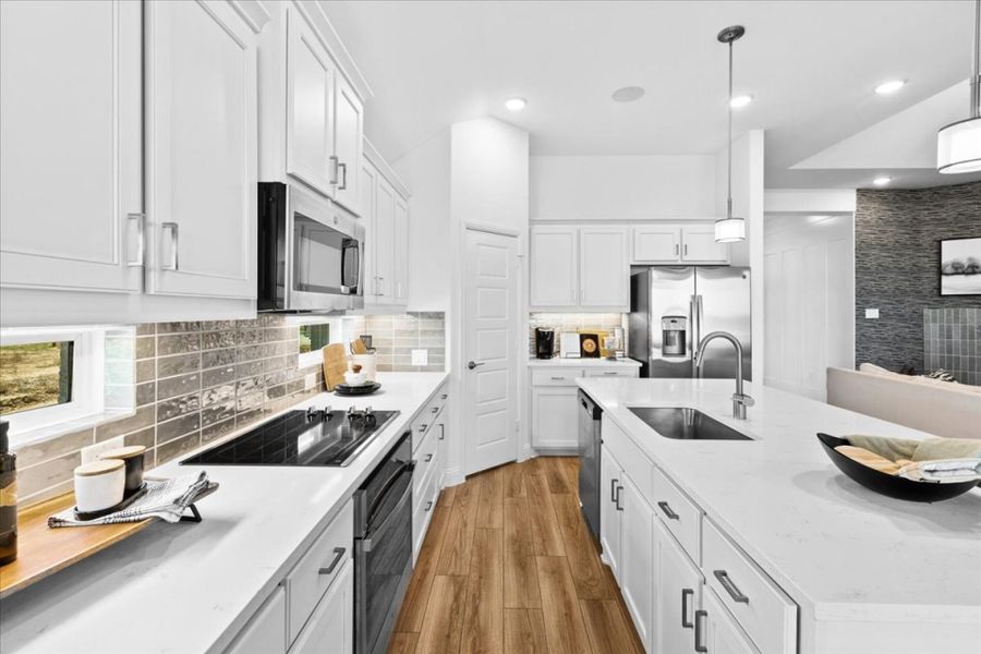 Furnished interior view inside a new home in Meadow Run, Melissa (Image 8).