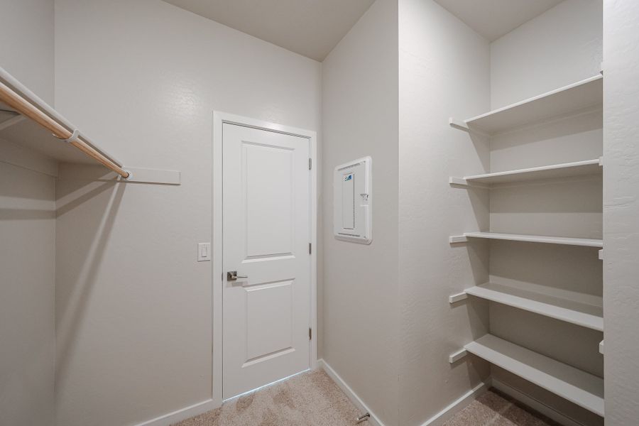 A white door in a room. A white door in a room.