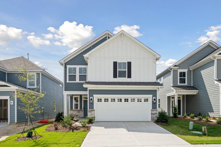 Representative exterior photo of a completed home built from the Rodanthe Premier by Taylor Morrison in Stafford at Langtree, Mooresville, NC (Image 17).