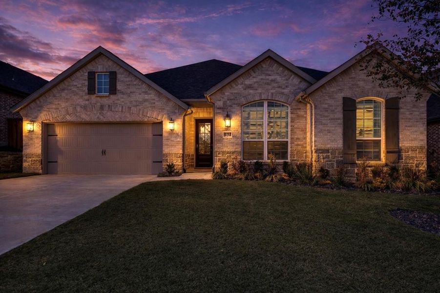Front exterior of a new home in Reunion, Rhome, TX, highlighting curb appeal (Image 22).