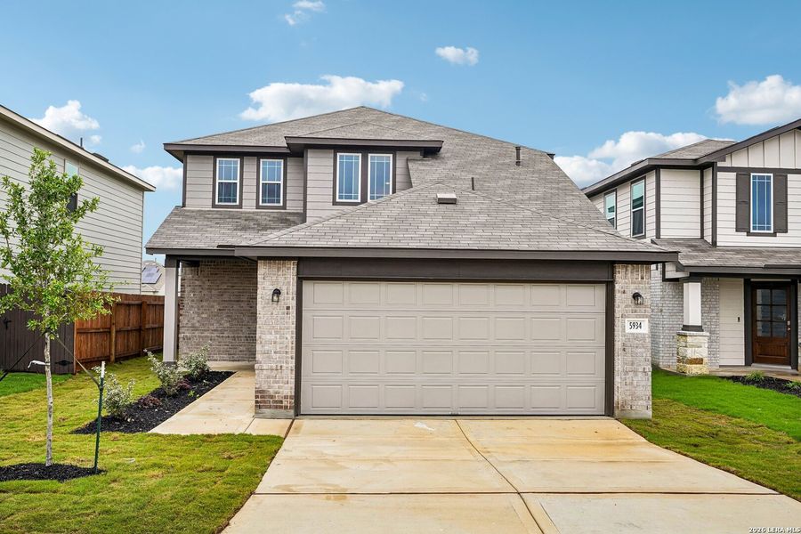 Front exterior of a new home in Willow Point, San Antonio, TX, highlighting curb appeal (Image 1). Front exterior of a new home in Willow Point, San Antonio, TX, highlighting curb appeal (Image 1).
