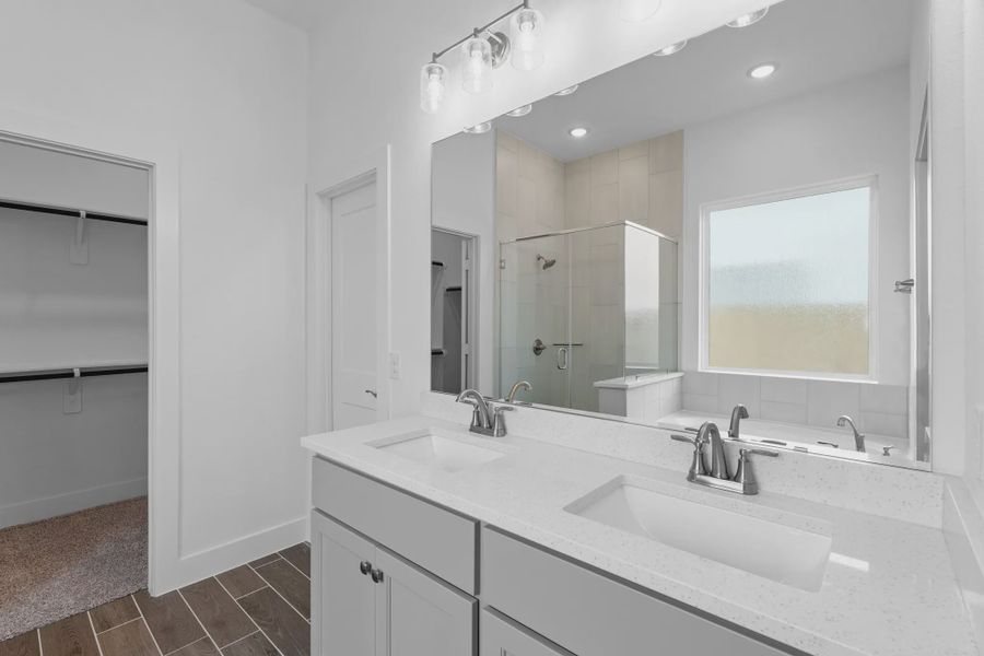 Image 32 representing the Oakmont by Chesmar Homes in Riceland Alley Loads, Mont Belvieu, TX.