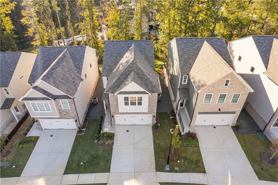 Front exterior of a new home in , Dacula, GA, highlighting curb appeal (Image 17).