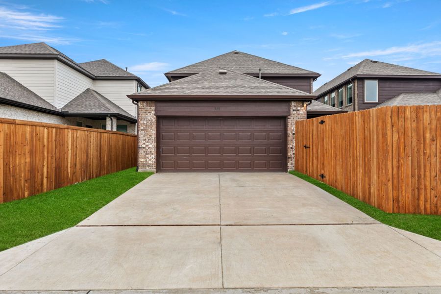 Representative exterior photo of a completed home built from the Willow by UnionMain Homes in Edgewater, Fate, TX (Image 17).