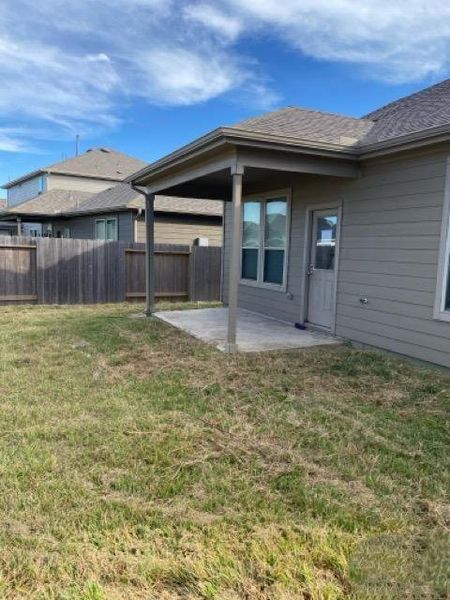 Exterior details and patio area of a home in Myrtle Gardens, Magnolia (Image 4). Exterior details and patio area of a home in Myrtle Gardens, Magnolia (Image 4).